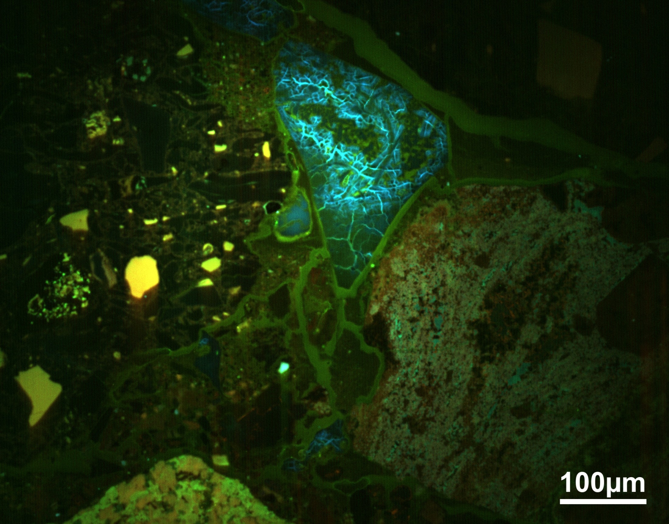 Composite RGB CL (Cathodoluminescence) image of some clasts in an impact brecia from the El’gygytgyn impact structure in Russia. The intensity of the luminescence is inversely correlated with the shock degree experienced by the investigated clasts.: Composite RGB CL (Cathodoluminescence) image of some clasts in an impact brecia from the El’gygytgyn impact structure in Russia. The intensity of the luminescence is inversely correlated with the shock degree experienced by the investigated clasts.